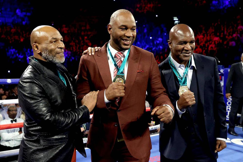 Mike Tyson, Evander Holyfield, Lennox Lewis/ Getty Images