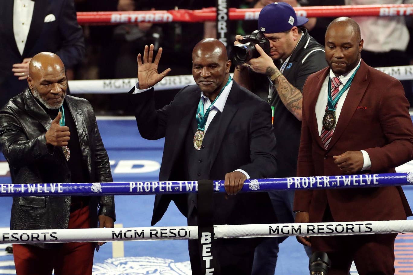 Mike Tyson, Evander Holyfield, Lennox Lewis/ PA