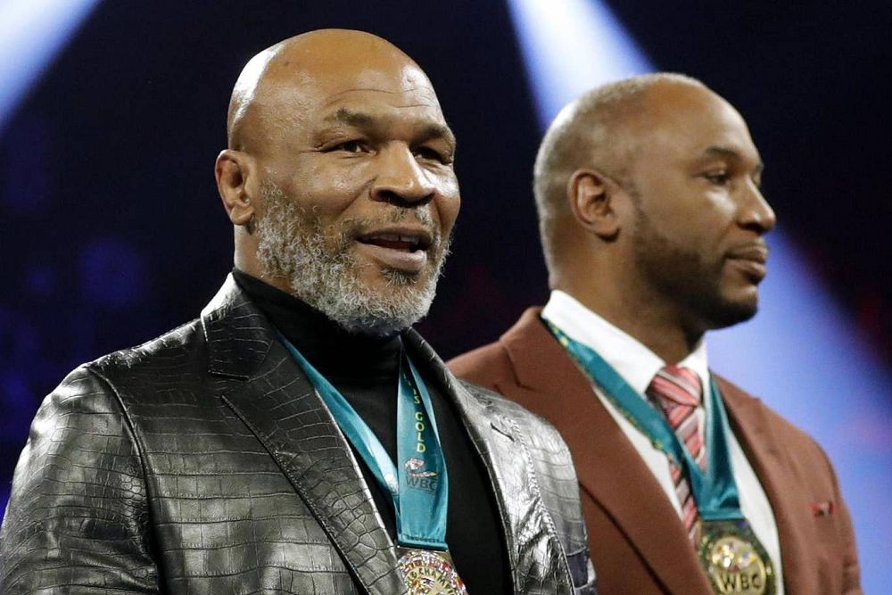 Mike Tyson, Lennox Lewis/ REUTERS